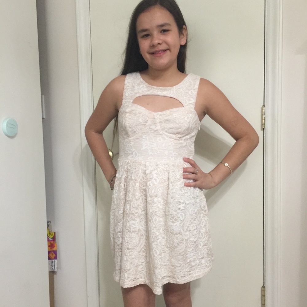 Mustard seed cream on white lace dress